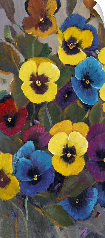A flower bed of colorful pansies on a vertical panel.