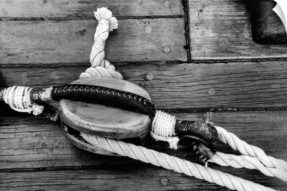 Black and white photograph of details of a sailboat.