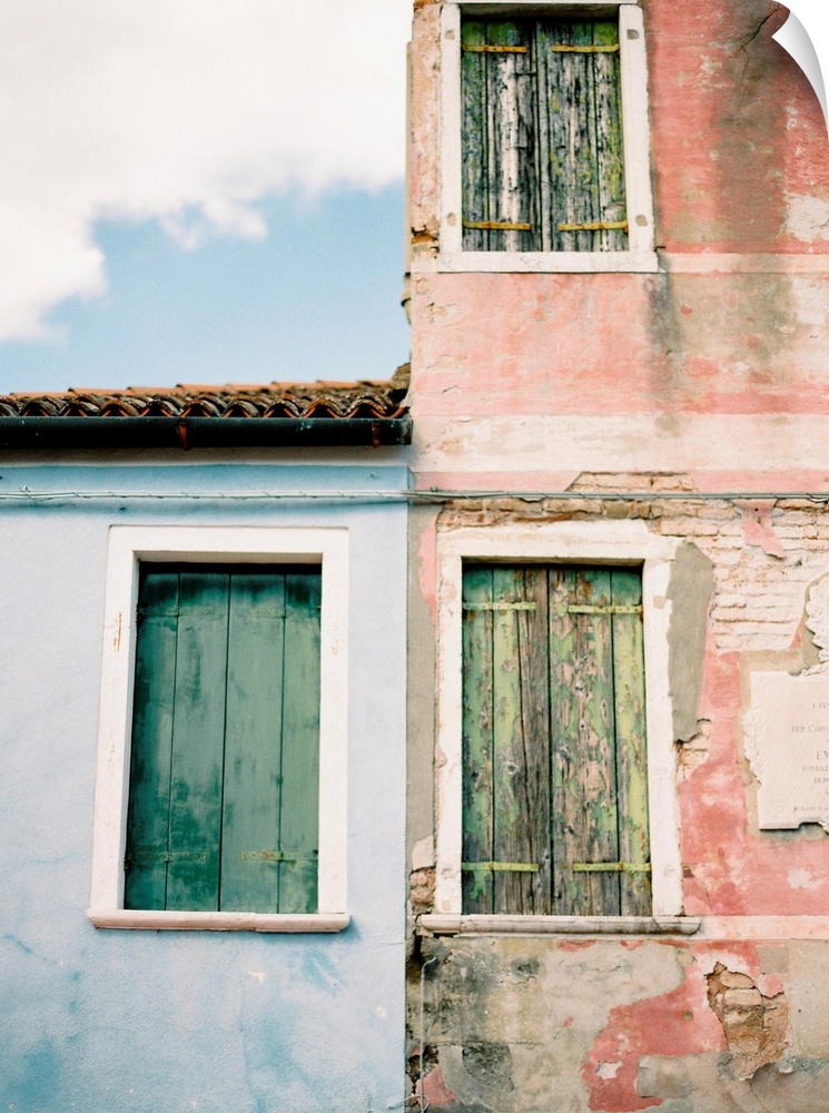 Photograph of old windows with wooden shutters, Burano, Italy.