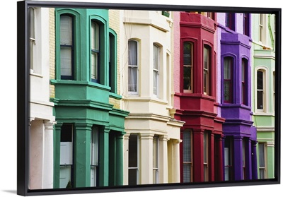 Colourful residential buildings in a row, Notting Hill, London, England