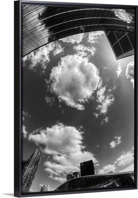 Black and white photograph of the sky in the city