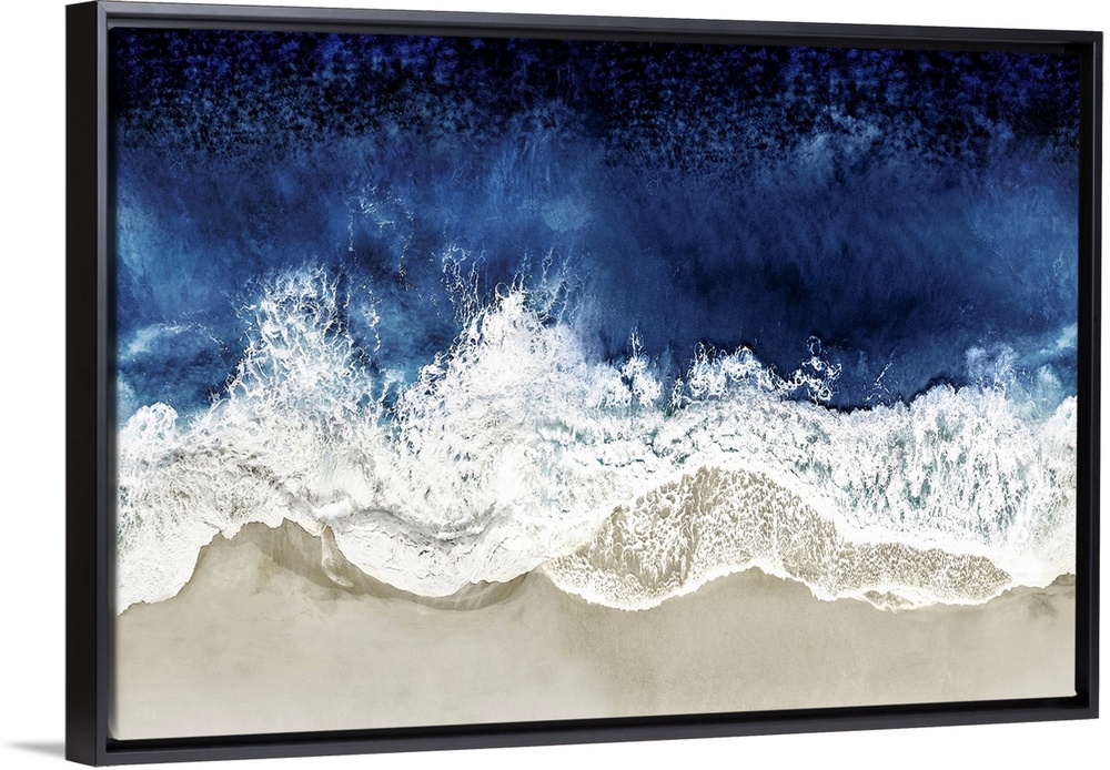 One artwork in a series of aerial shots of a beach as dark blue waves break upon the shore.