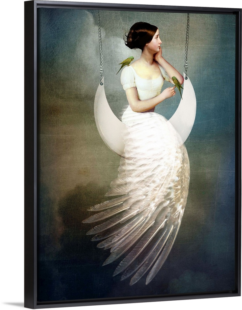 A conceptual portrait of a female with a feather dress sitting on a moon swing.