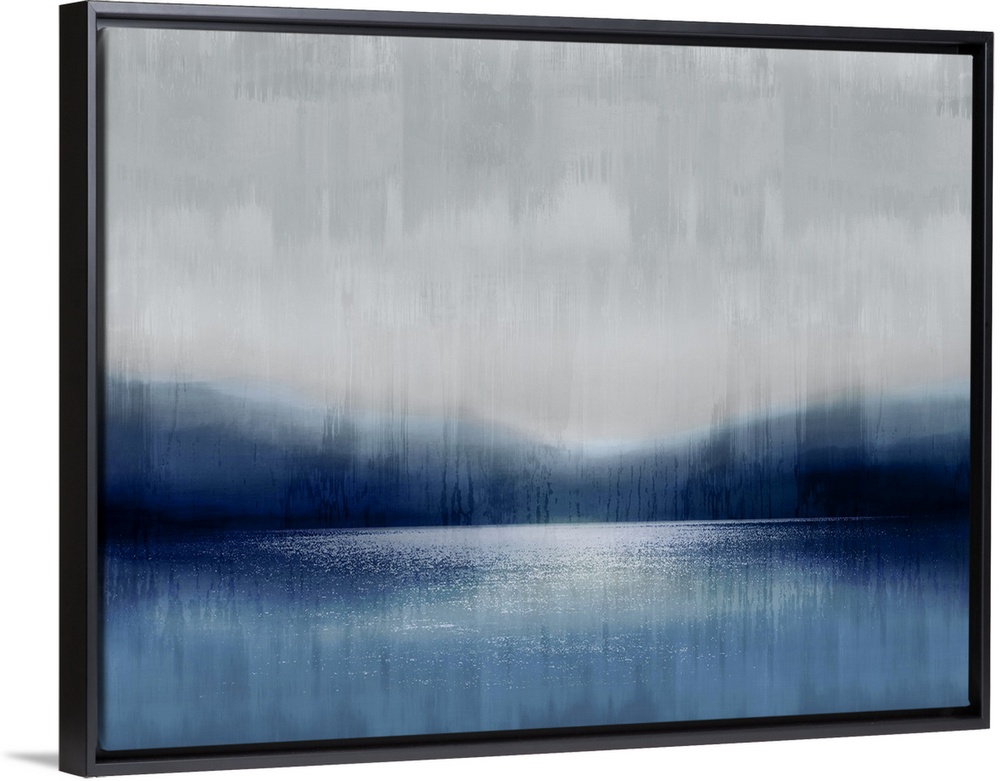 A misty, tranquil scene of a lake infront of mountains under a cloudy sky. The water and earth are in tones of blue and da...