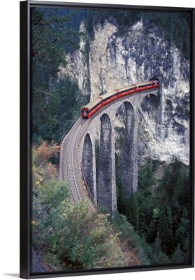 Switzerland, Passenger Train On The Tallest Rock Bridge In Switzerland