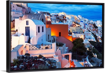 Greece, Aegean islands, Cyclades, Santorini island, Oia village illuminated at dusk