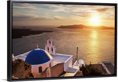 Greece, Santorini island, church overlooking the sea and the caldera at sunset, Fira