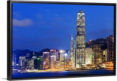 Hong Kong, City skyline illuminated at night with International Finance Center