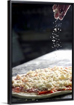 Italy, Campania, Naples, Maria Cacialli making a pizza margherita