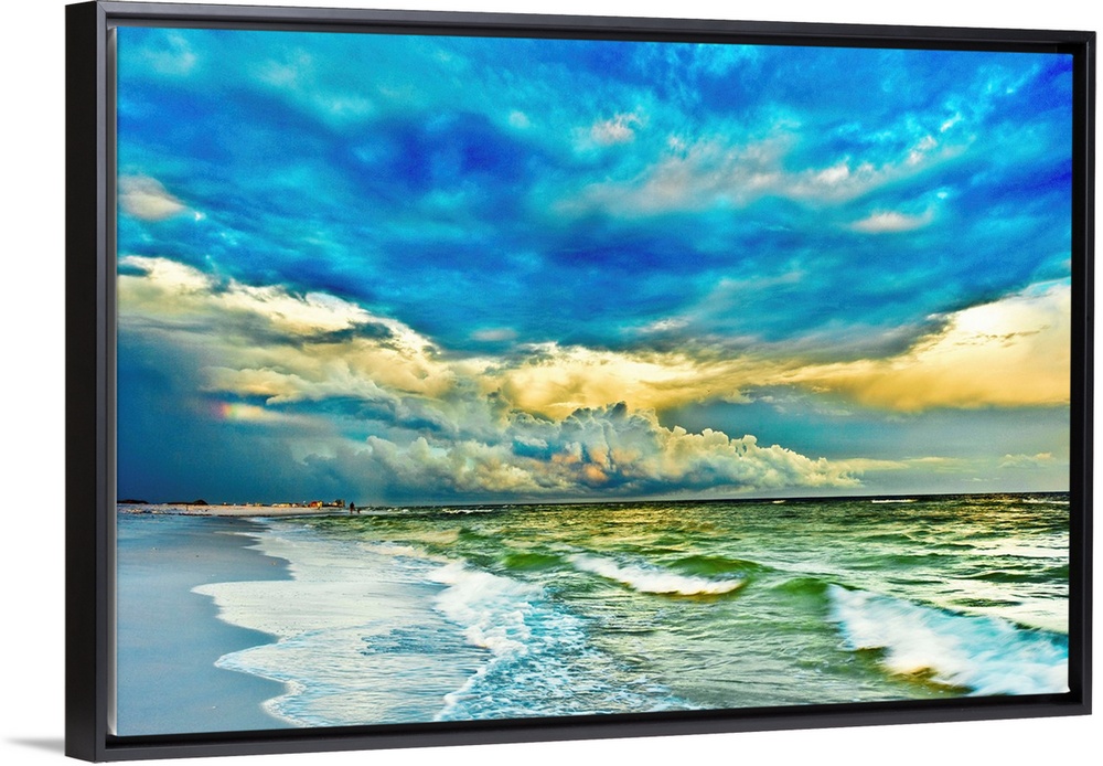 A blue and turquoise sea with a painted looking sunset. This makes for a beautiful landscape photography print of a blue a...