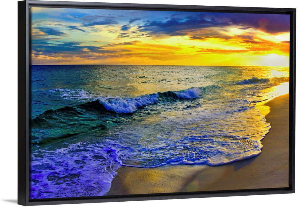 Image of waves rolling over Navarre beach before a dark yellow sunset seascape. Landscape taken on Navarre Beach, Florida.