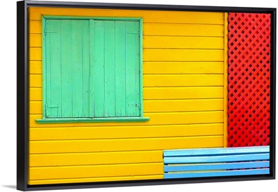 A colorful detail of Caminito in La Boca, Buenos Aires, showing green shutters