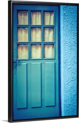 Blue door with blue wall.