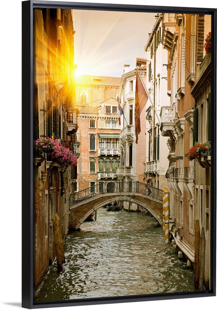 Large portrait wall hanging of buildings and a bridge in a canal in Venice, Italy.