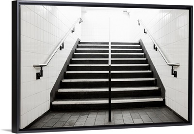 Empty stairwell fading to white