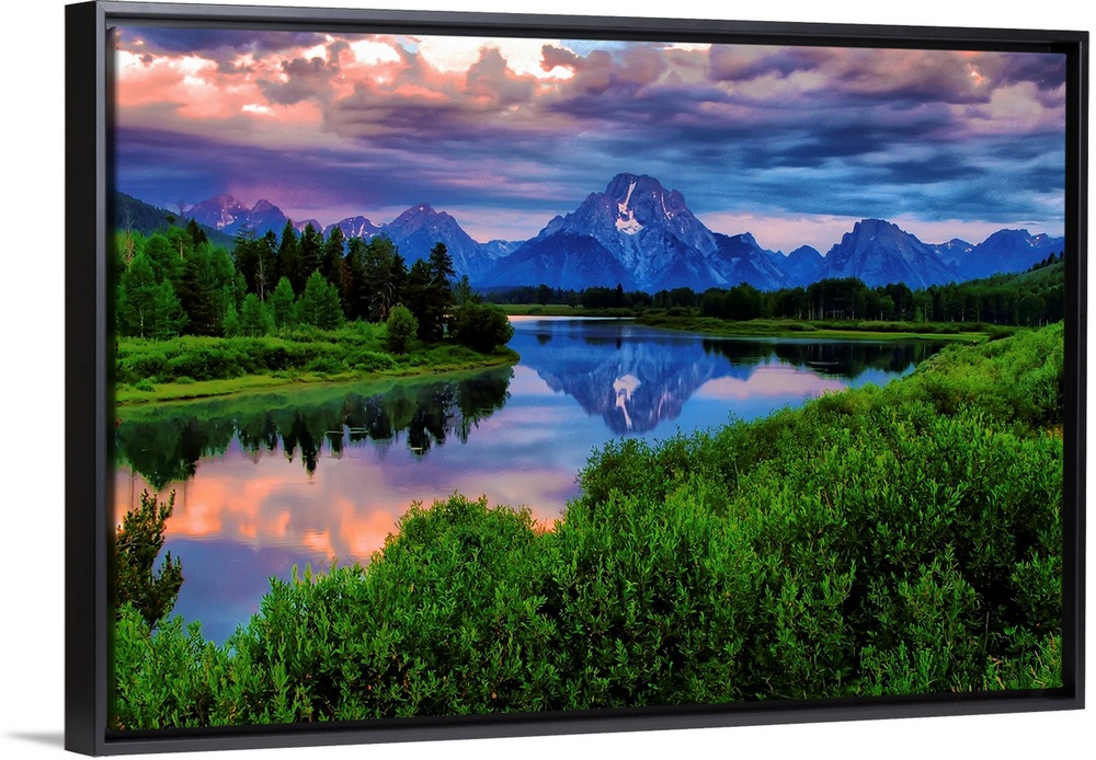 Giant, landscape photograph of morning light breaking through a stormy cloud cover over the Snake River, at Oxbow Bend in ...
