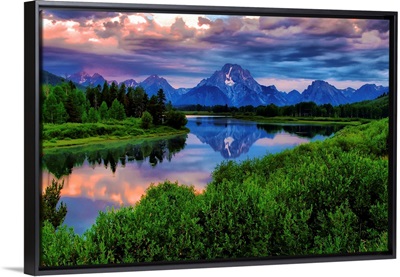 Light breaks through clouds over the Snake River at Oxbow Bend in Grand Tetons