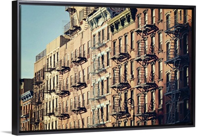 Lower east side cityscape of building fire escape stairs and windows, New York.