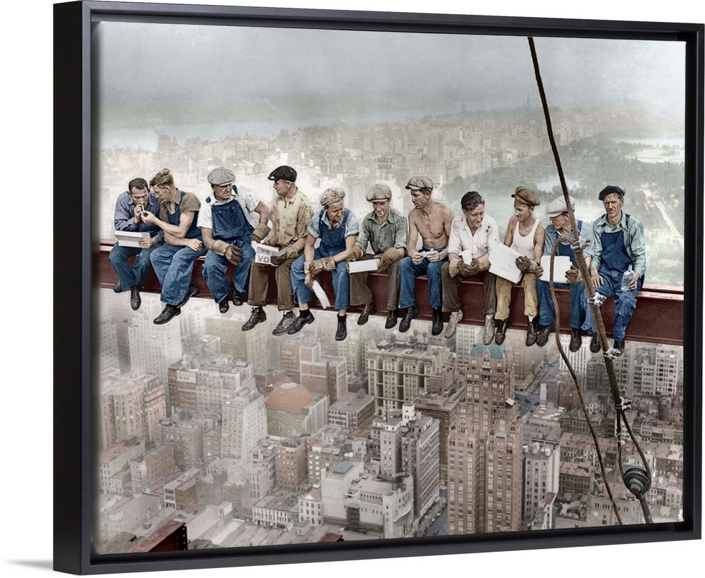 29 Sep 1932, Manhattan, New York City, New York State, USA --- Construction workers eat their lunches atop a steel beam 80...