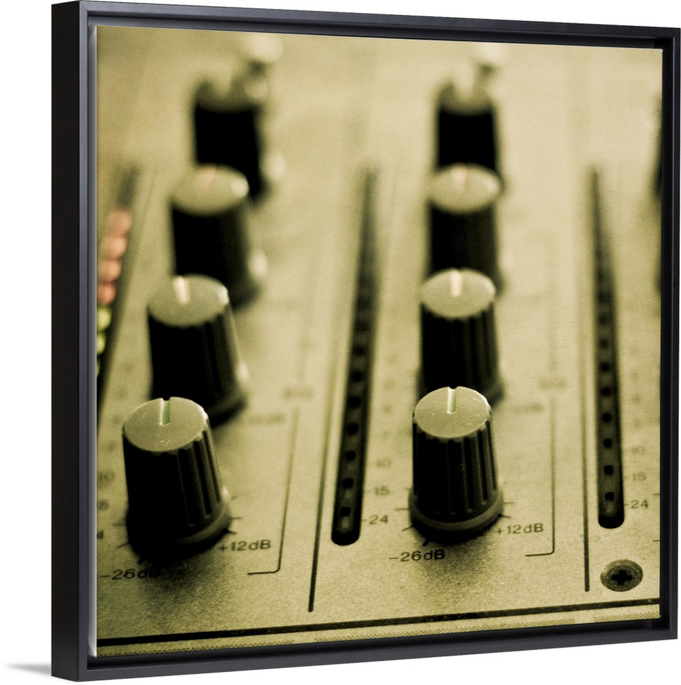 Setting knobs on a DJ mixer for adjusting the sound output.