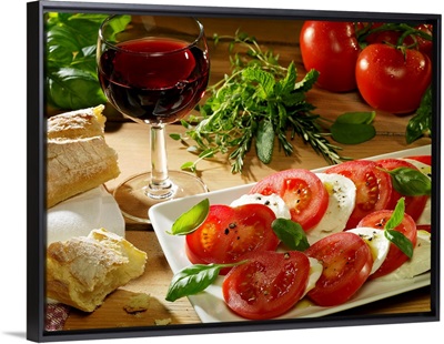 Slices of tomato and mozzarella on tray