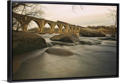 Train cruising over James river in Richmond, Virginia.