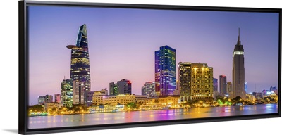 Central Ho Chi Minh City skyline and Saigon River at dusk, Vietnam