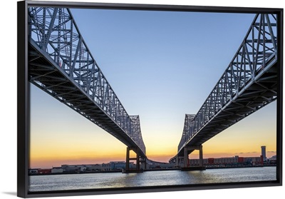 Crescent City Connection, twin span bridges over the Mississippi River at sunset