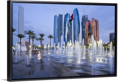 Etihad Towers time lapse viewed of the fountains of the Emirates Palace Hotel, Abu Dhabi