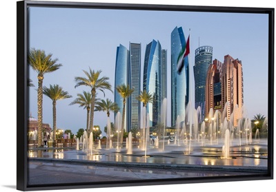 Etihad Towers time lapse viewed over the fountains of the Emirates Palace Hotel