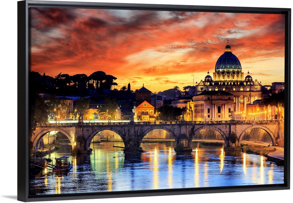 Italy, Rome, St. Peter Basilica by night reflecting on Tevere river