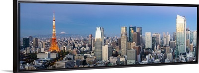 Japan, Tokyo, elevated night view of the city skyline and iconic illuminated Tokyo Tower
