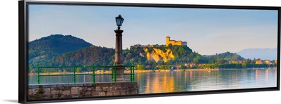 La Rocca fortress viewd from Arona at sunset, Lake Maggiore, Piedmont, Italy