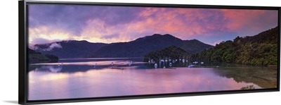 Sunset illuminates the picturesque Ngakuta Bay, Queen Charlotte Sound, New Zealand