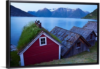 The picturesque village of Utne nestled into a little bay, Norway