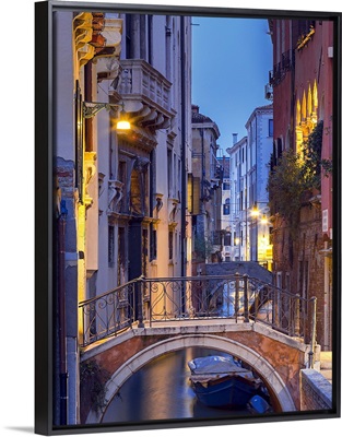 Venice, Veneto, Italy, View over a bridge and a canal at dusk