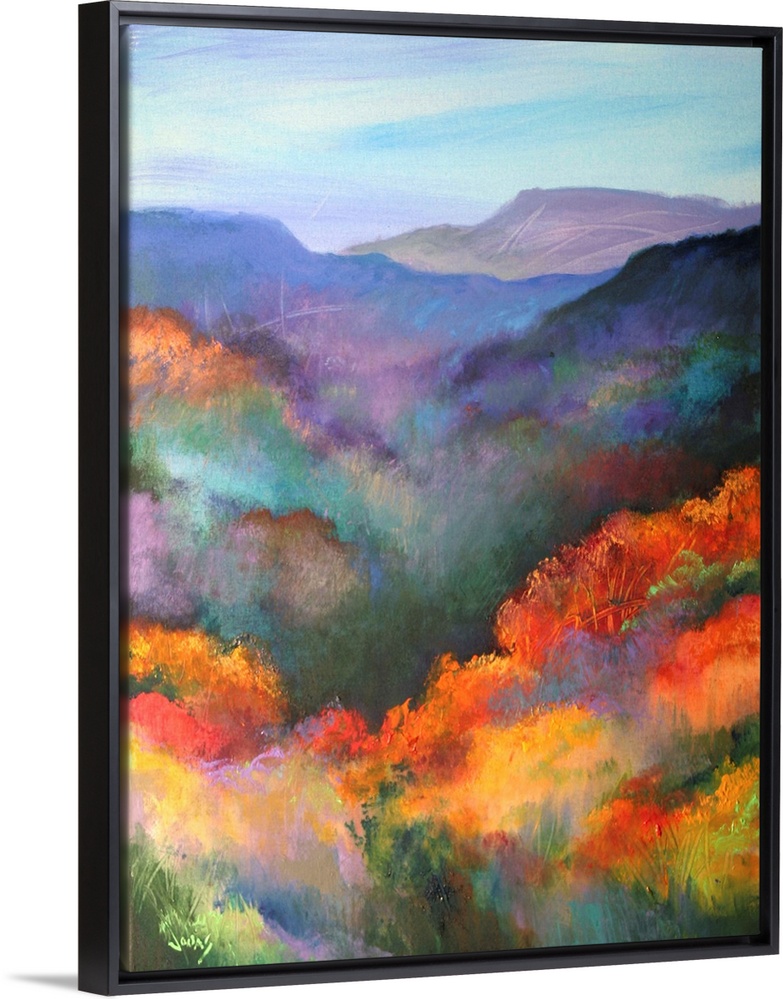 Tall canvas painting of brightly colored trees with mountains in the distance.