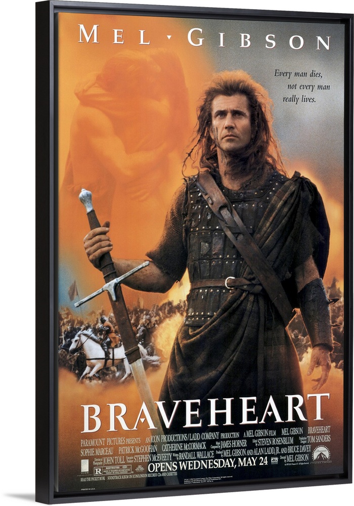 Big, vertical movie advertisement on a wall hanging for Braveheart, Mel Gibson stands as a warrior in front of a battle sc...