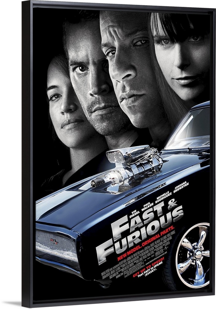 Large, vertical movie advertisement for the Fast & Furious 4.  A muscle car in the foreground with the movie title and cre...