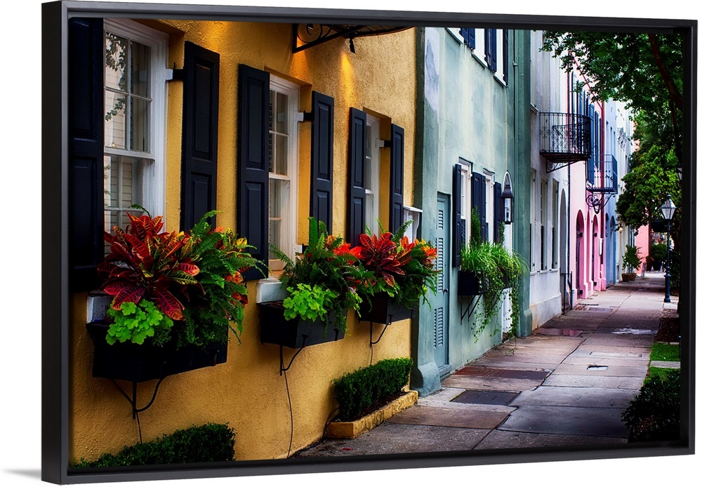 Fine art photo of a shaded alley with colorful buildings in Charles, South Carolina.