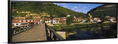 Bridge across a river with a city in the background Veliko Tarnovo Bulgaria