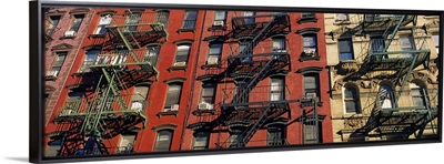 Low angle view of fire escapes on buildings, Little Italy, Manhattan, New York City, New York State