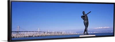 Willie McCovey statue with bridge in the background ATT Park Bay Bridge San Francisco California