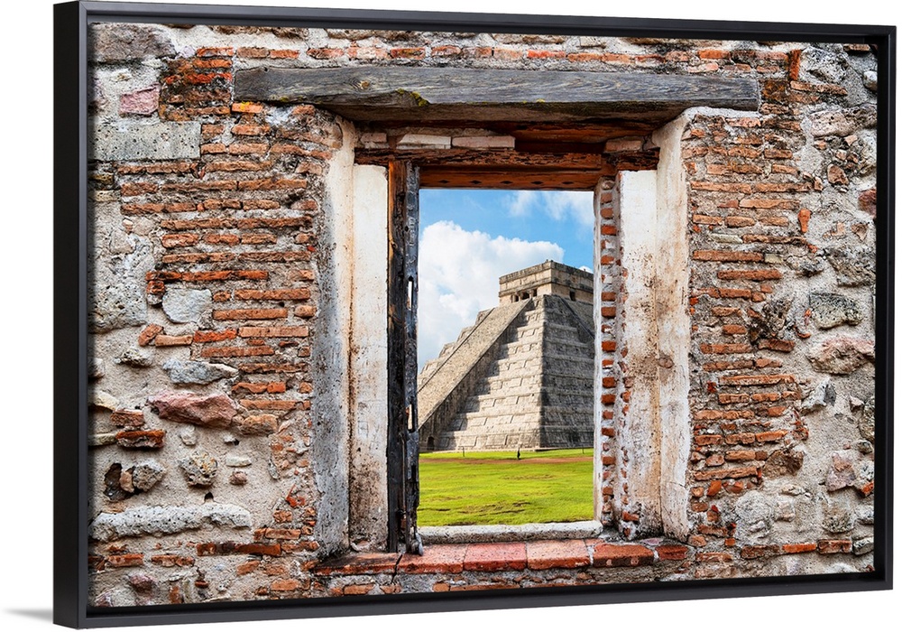 View of El Castillo Pyramid in Yucat?n, Mexico, framed through a stony, brick window. From the Viva Mexico Window View.�