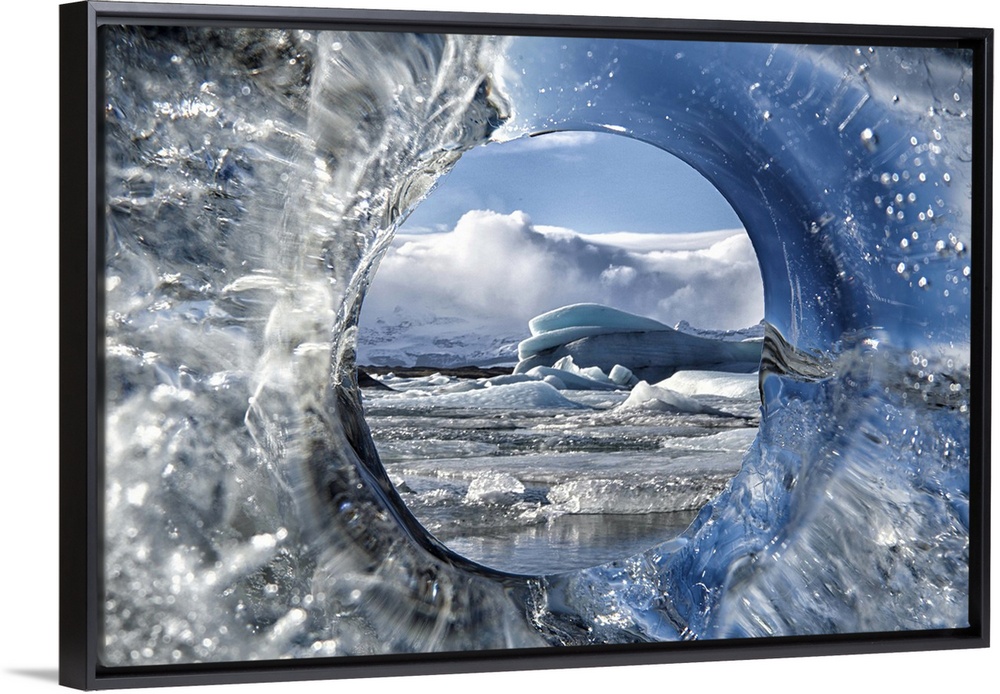 Looking through a hole of ice from a glacier.