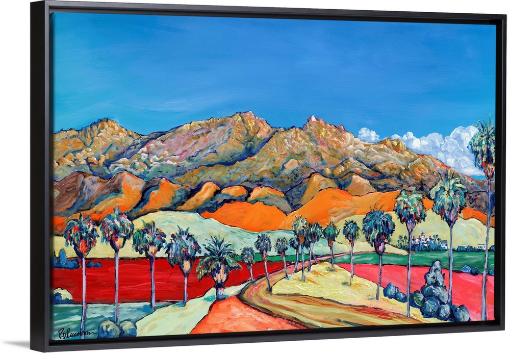 San Diego desert in exciting bright and bold colors. Blue skies and swaths of color, rugged mountains with a Palm tree lin...