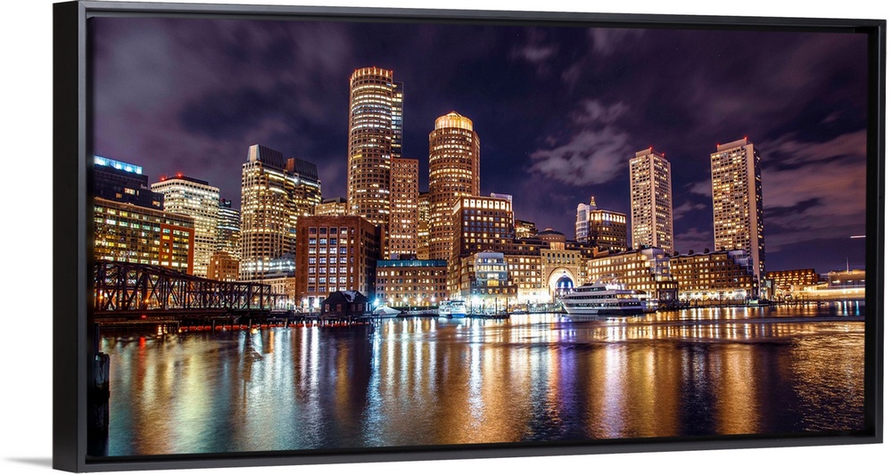 Photo of Boston city skyline and waterfront from the view of the Harborwalk.