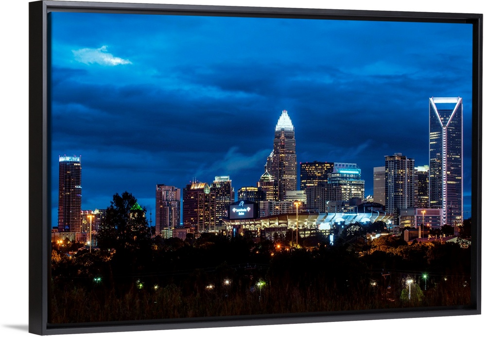 Horizontal image of the city of Charlotte, North Carolina at night.