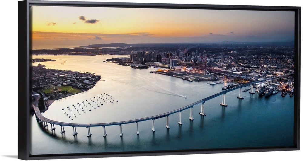 Aerial view of the Coronado Bridge in San Diego, California, at sunset.