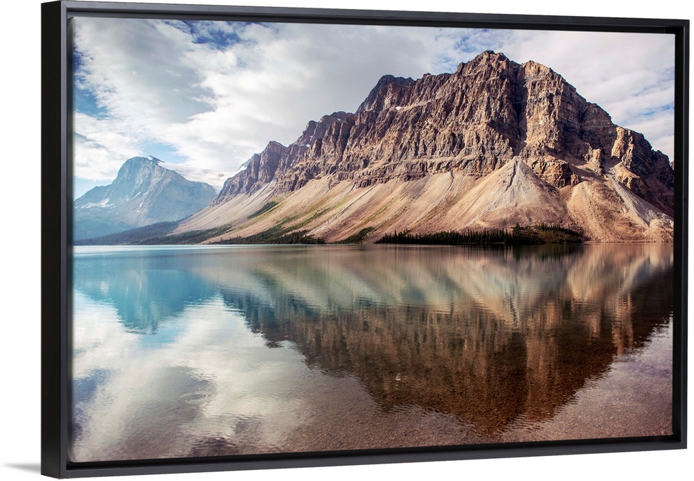 Crowfoot Mountain reflected in Bow Lake located in Banff National Park, Alberta, Canada.